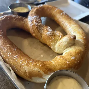 Pretzel with cheese and mustard