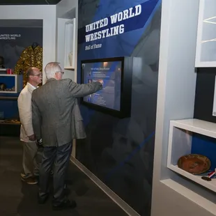Interactive kiosks provide opportunities to learn more about wrestling's legends.