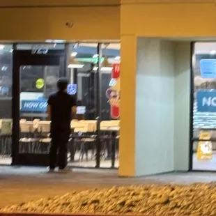 Customer waiting outside locked door during business hours