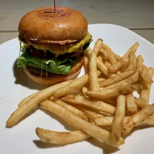 Jr. Classic Burger (4oz Harris Ranch Grass Fed Beef, Cheddar, Lettuce, Tomato, Red Onions, Pickles, and House Island Sauce) and Fries