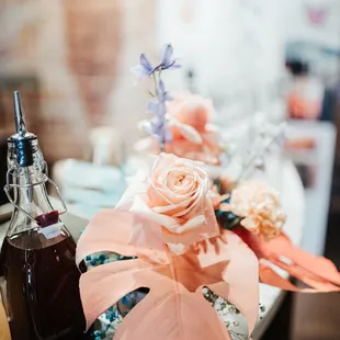 bottles of alcohol and flowers