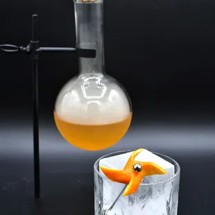 an orange peel in a decanter