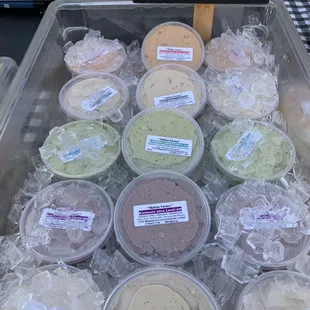 a display of different varieties of dips