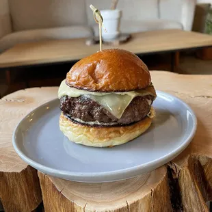 Native Fields Grass Fed Burger made with 8oz Dry aged Beef, Caramelized Onions, Gruyere Cheese, and Russian Dressing