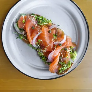 Smoked Salmon Toast  Levin Toast with Mashed Avocado, Smoked Salmon, Capers and Radishes