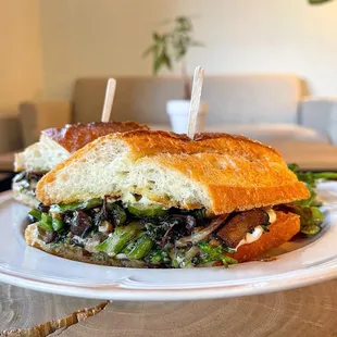 Broccolini &amp; Mushroom Sandwich made with Broccolini, assorted Mushrooms, with Burrata Cheese, Bagna Cauda, and  Aioli in a Baguette