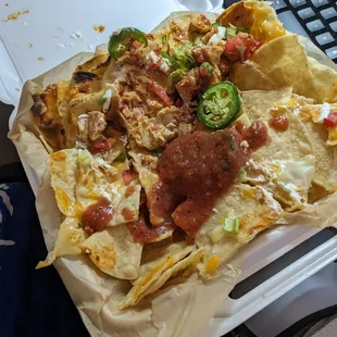Nachos with chicken. Look hard for the Chicken.