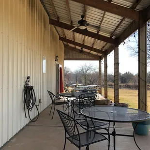 patio area with tables and chairs