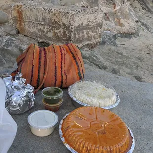 To go from Natraj! Paneer Tikka masala ($17) comes with rice and pickles. Samosa (foil wrap $6) comes with 2 pieces.