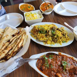 Mutton curry, mutton biriyani, butter Naan, coconut curry shrimp, chicken Tikka masala