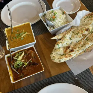 The red one is the chicken Balti, the orange one was a coconut shrimp soup with very delicious garlic naan.