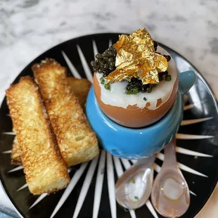 an egg and toast on a plate