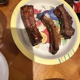 Ribs appetizers on a cute kids plate