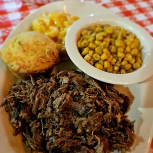 Chopped brisket, mac and cheese, smokehouse corn, and jalapeño cornbread.