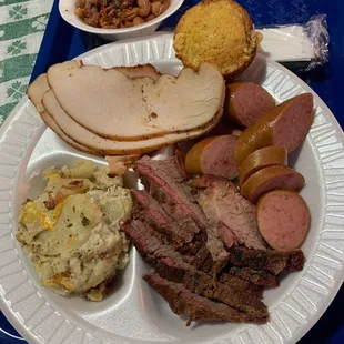 Brisket, sausage, smoked turkey, 2 sides $13.95