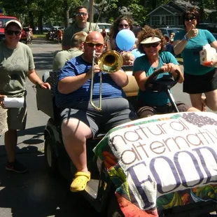 a group of people riding in a cart