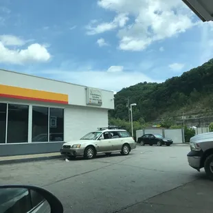 "Candleberry Candles on sale inside" (and "ATM inside")