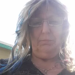 a woman with blue hair