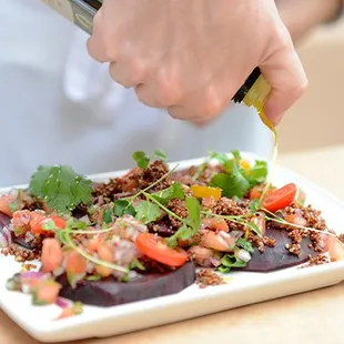 a plate of food being prepared
