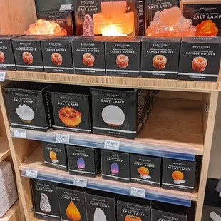a display of himalayan salt lamps