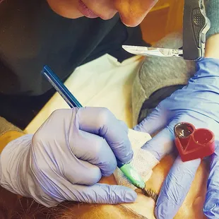 Regina doing permanent makeup - the SofTap Hand Method