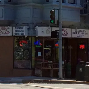a street corner with a green traffic light