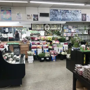 Fresh flowers and fresh sushi displays.