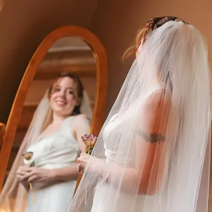 Beautiful bride in mirror - Prairie Star Restaurant - albuquerque wedding photographer