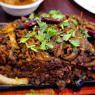 Pepper Mutton 5/5
 Spicy &quot;pulled&quot; style mutton. Perfect to go with the rumali roti.