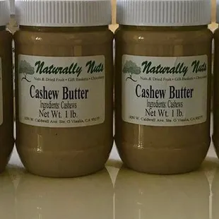 a row of jars of peanut butter