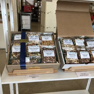 two boxes of nuts on a table