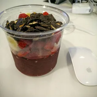 Acai bowl with banana, strawberry, rasberry, and chocolate pretzel. Bigger than it looks...mouse for size