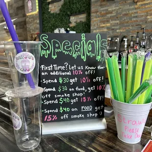 a glass of water and strawberries