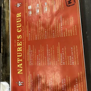 a menu on a wooden table