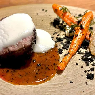 Kiawe smoked, grass fed Beef Tenderloin served with roasted turnips and local carrots. Served with jus de veau lie with black winter truffle