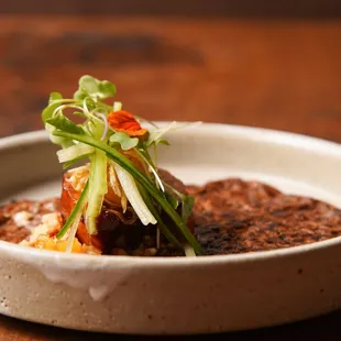 a bowl of food on a table
