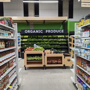 a grocery aisle with produce