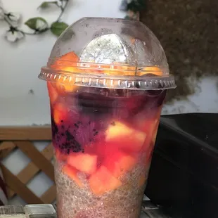 a smoothie in a plastic cup