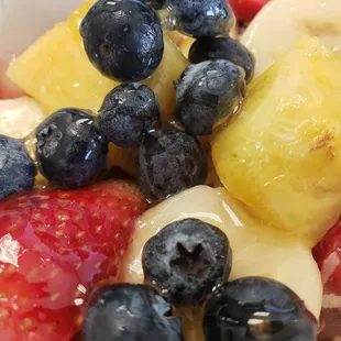 a bowl of fruit and yogurt