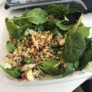 a salad in a plastic container