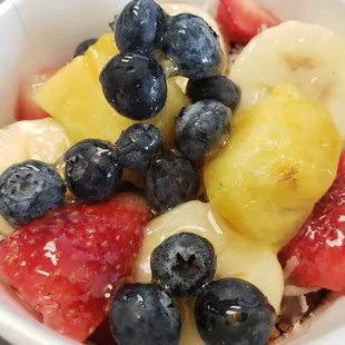 a bowl of fruit and yogurt