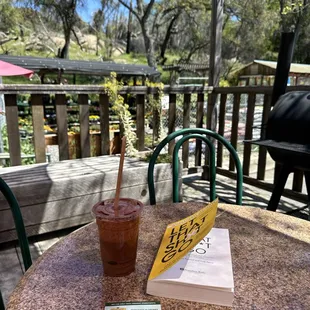 Enjoying a good book and a yummy chunky monkey smoothie.