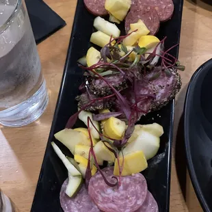 Relish Board: Pickled blueberries, blackberries, assorted cured meats