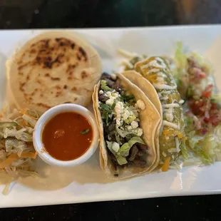 Combo #2 soft taco cheese papas, and an enchilada.