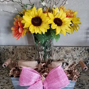 a vase of sunflowers