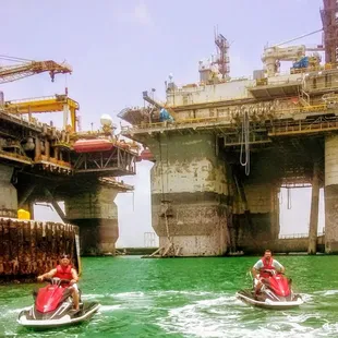 Customers (now friends) seeing up close and personal the offshore rigs with Nauticool Adventures in Port Aransas Texas.