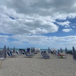 lounge chairs and umbrellas on the beach