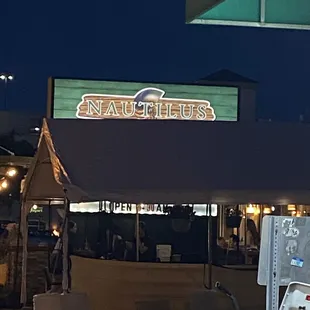 Outdoor sign, lit up