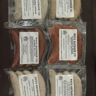 six packages of sausage