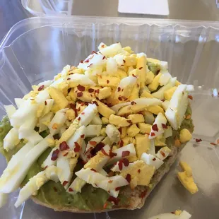 Avocado toast on a bagel
